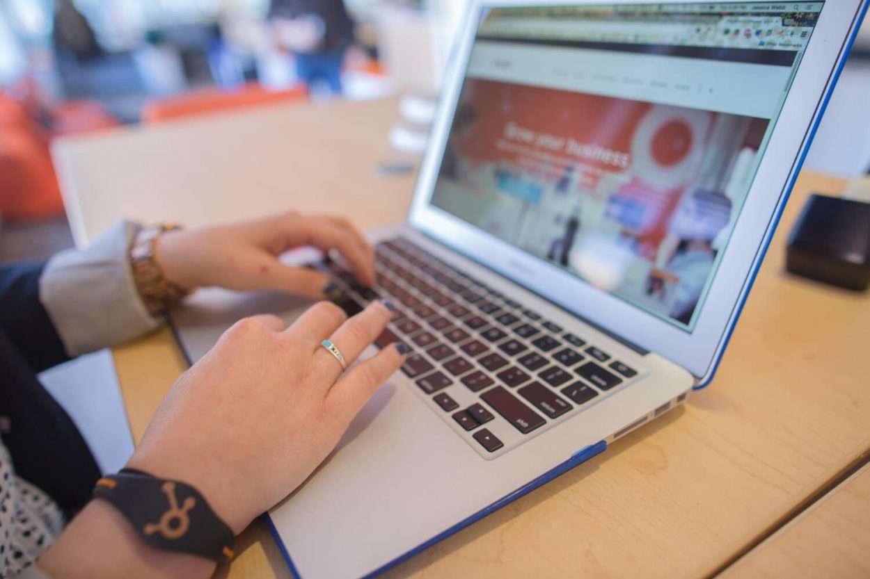 “Sharing Economy” Jobs Share Same Independent Contractor Issues as “Regular Economy” hands typing on laptop