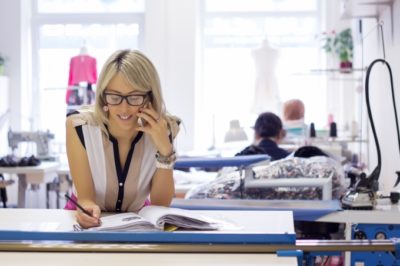 woman-on-the-phone-in-a-small-business