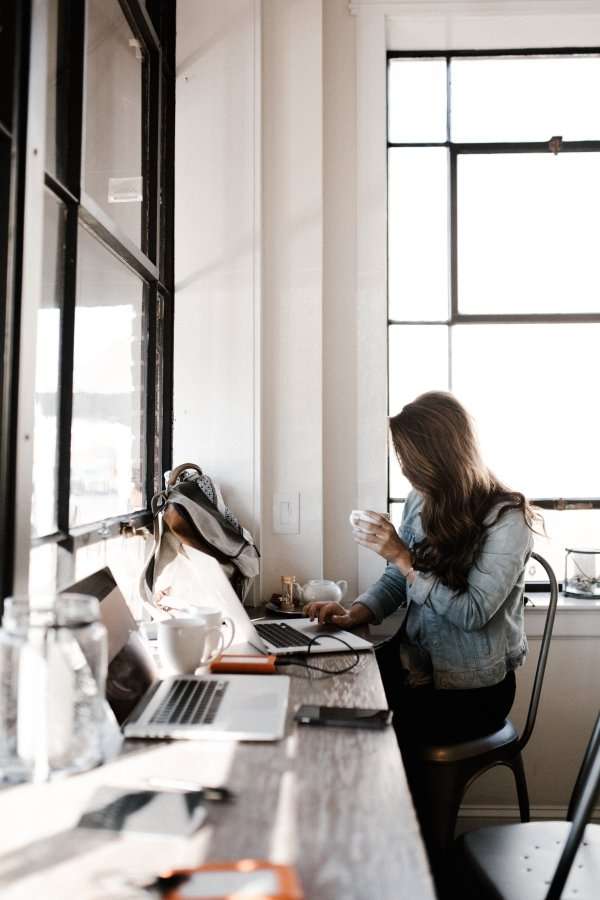 U.S. gig workers get support from private companies, but public policy lags woman working at laptop